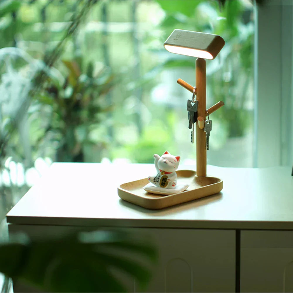 Elegante LED-Tischlampe mit Stauraum