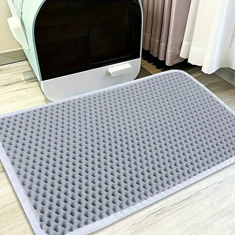 Alfombrilla para arena de gato con función de rascar
